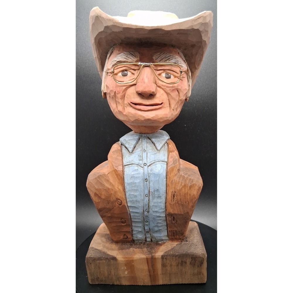 #187 Klink Hand Carving of Man with glasses